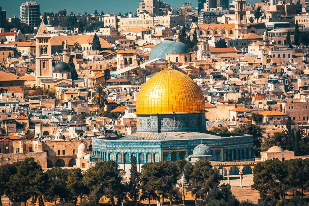 aerial view of city buildings during daytime | tips ziarah ke Tanah Suci Palestina Iftida Al Aqsa